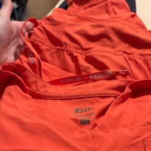 Insight by MedCouture Vibrant Orange Coral joggers and 1 pocket top.